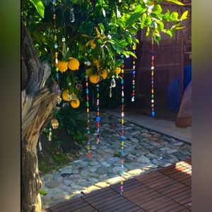 1 ea Candie catcher. Multicolored and multi faceted crystal and glass suncatcher